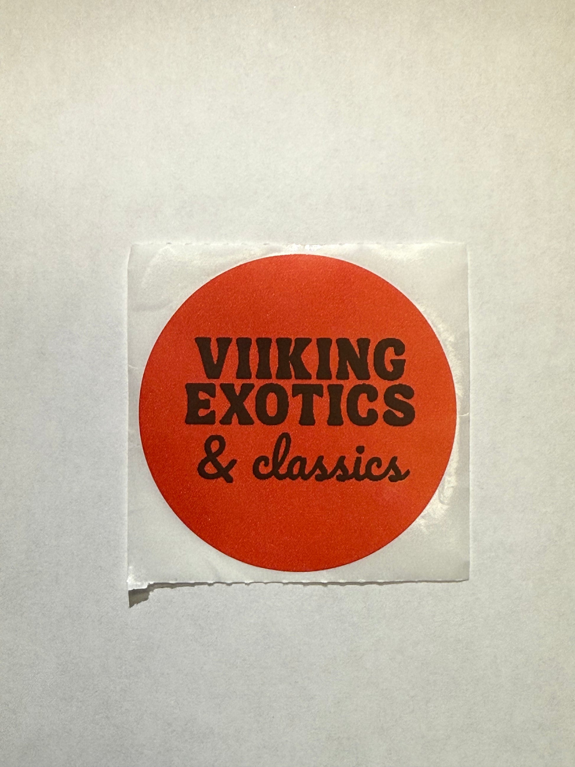 VEC red round sticker